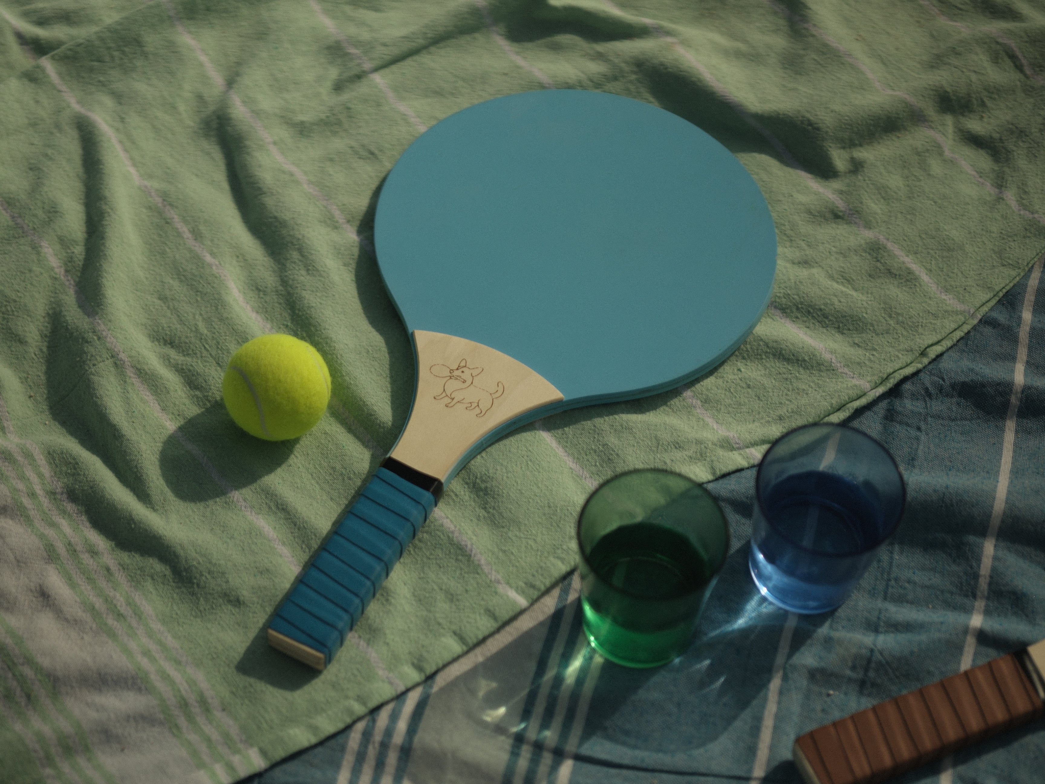 blue racket wooden paddle with grip outdoor play beach fun 