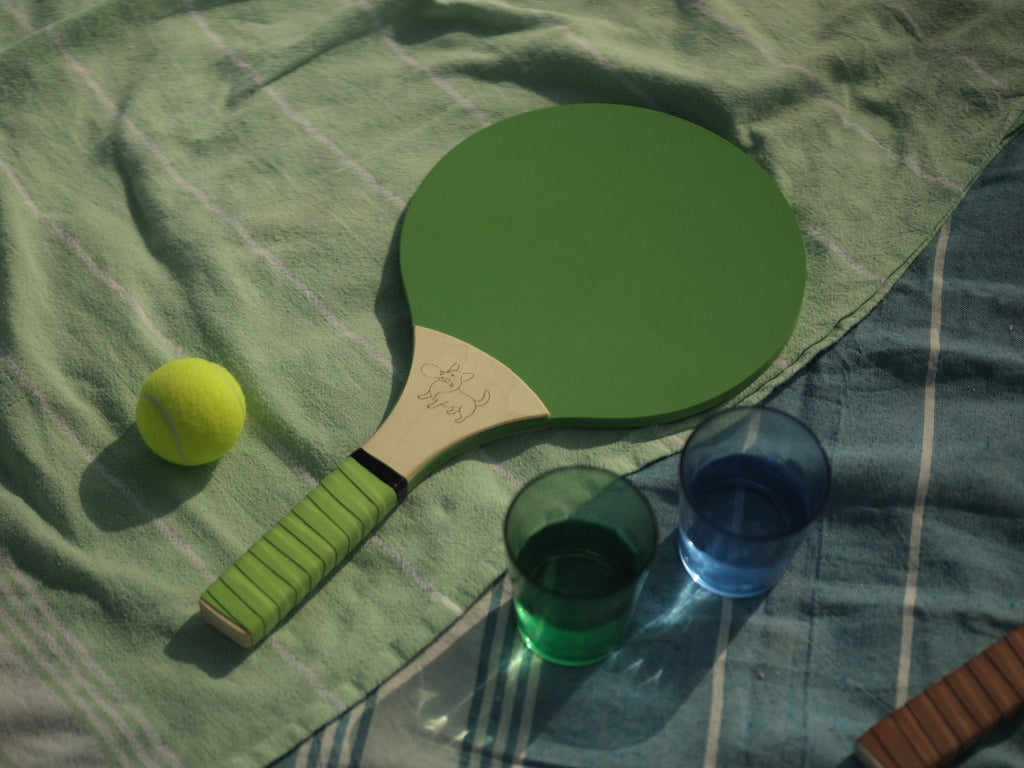 pastel green wooden racket paddle tennis outdoor play beach grip fun